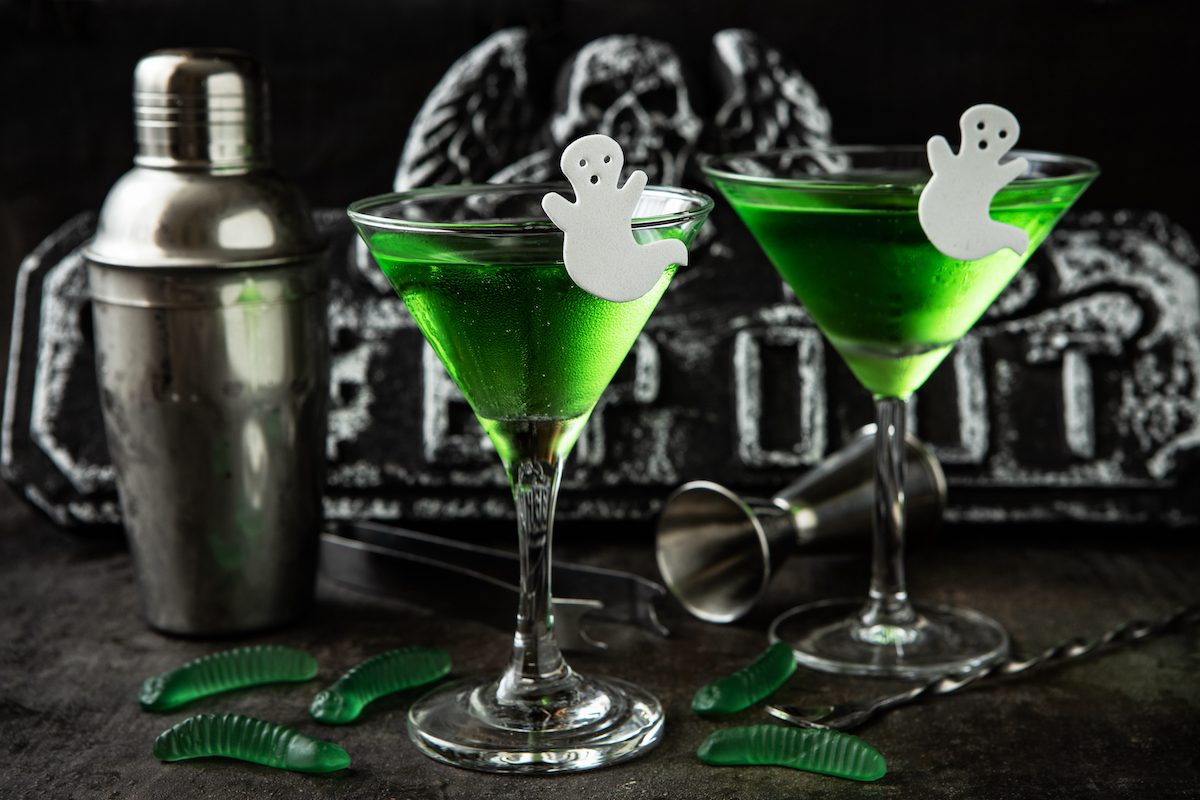 spooky cocktails in martini glasses with ghost charms