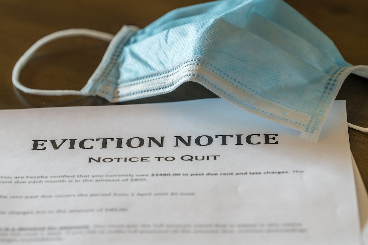 Mask over an eviction notice