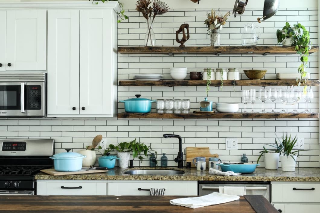 How to organize kitchen cabinets: Add clear containers, vertical food storage containers and corner cabinets to avoid wasted space and unused space to keep your kitchen organized while everything is in plain sight